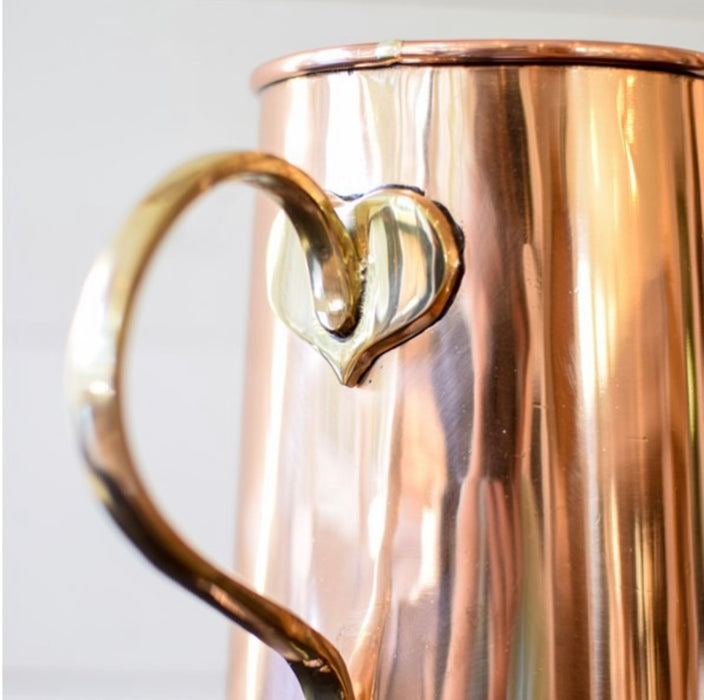 copper and brass pitcher